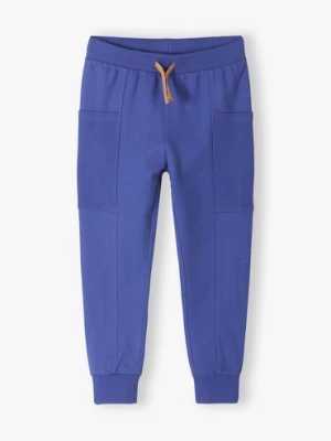 Bawełniane dresowe spodnie dla chłopca regular fit - niebieskie 5.10.15.