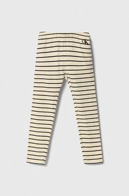 Calvin Klein Jeans legginsy dziecięce kolor beżowy wzorzyste