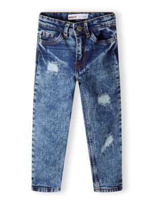 Ciemnoniebieskie chłopięce spodnie jeansowe z przetarciami Minoti