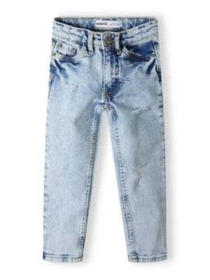 Jasnoniebieskie chłopięce spodnie jeansowe z przetarciami Minoti