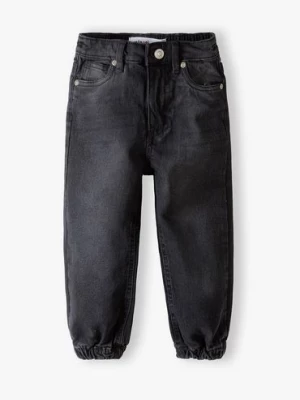 Spodnie jeansowe typu joggery dziewczęce - czarne Minoti
