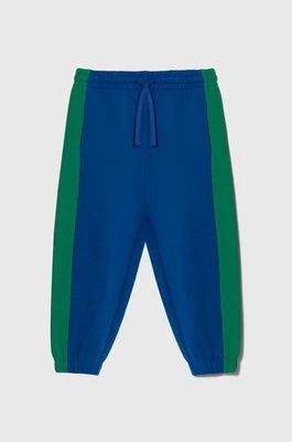 United Colors of Benetton spodnie dresowe bawełniane dziecięce kolor niebieski wzorzyste